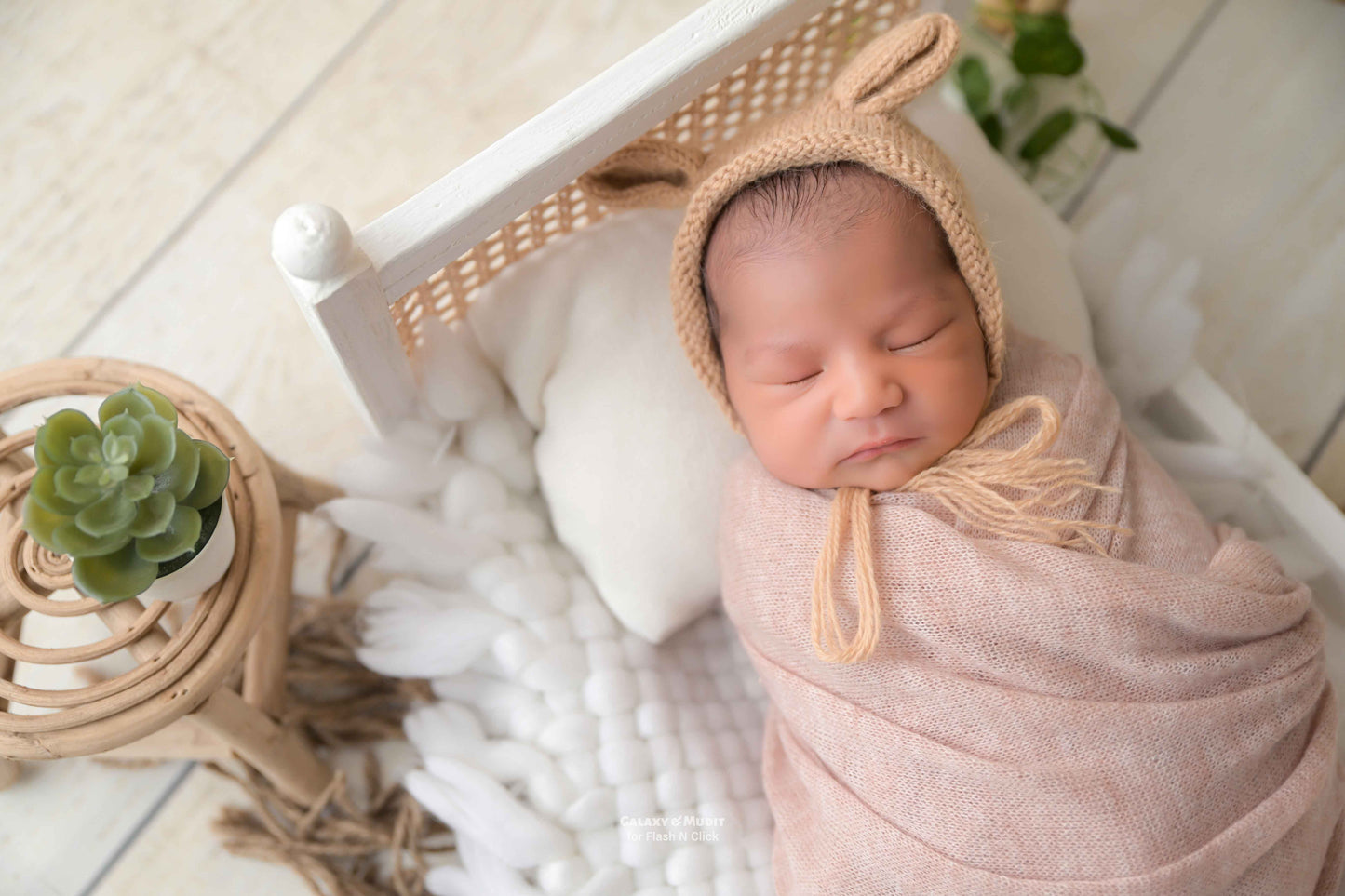 Newborn photoshoot English bed