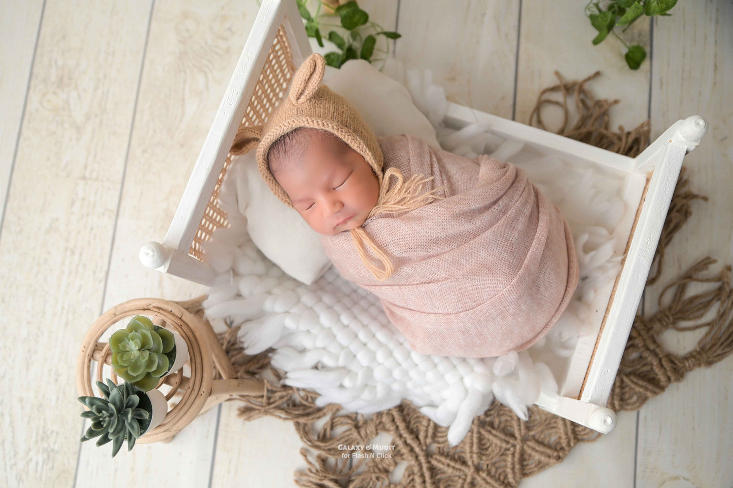 Newborn photoshoot English bed